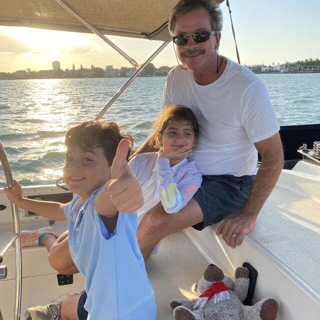 Captain Tim with young guests on board