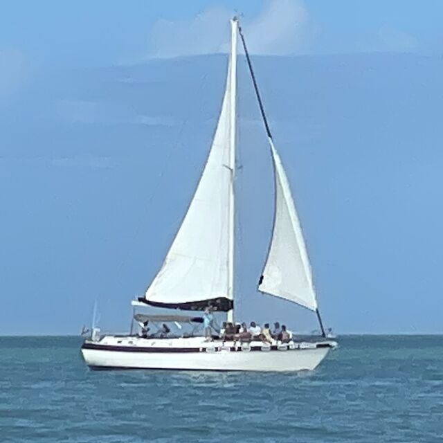 The Key Breeze under sail on a sunny day